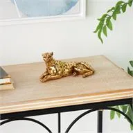 Gold Resin Leopard Laying Sculpture with Textured Spots